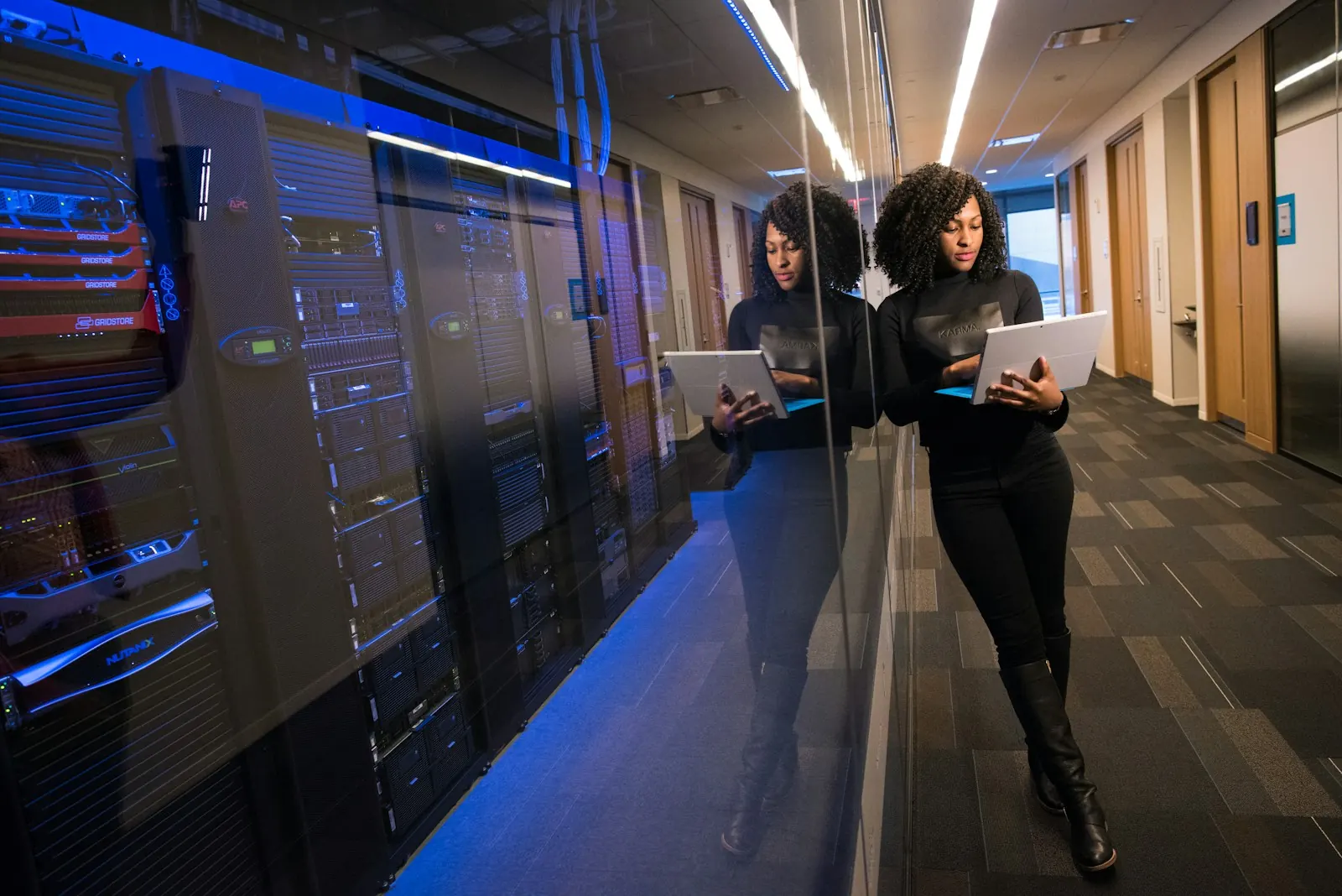 IT professionals working in a server room